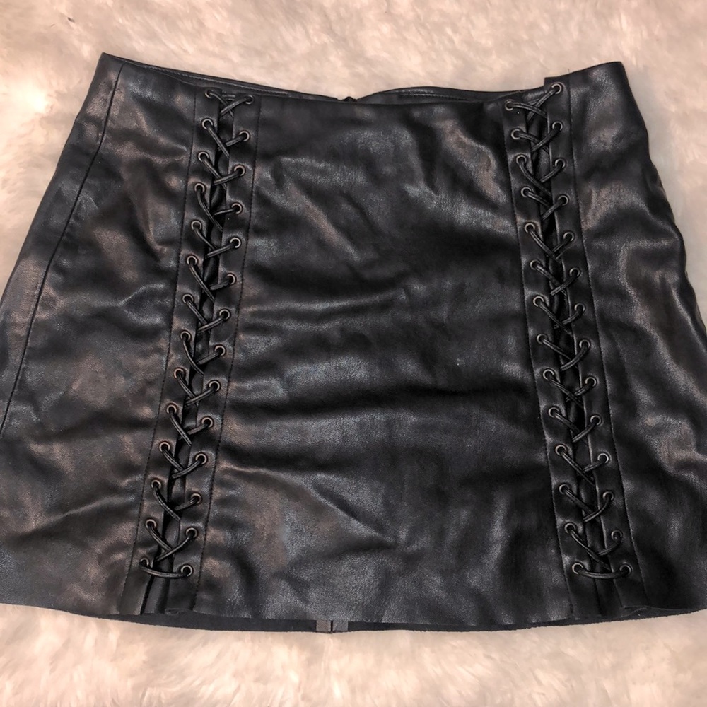Laced leather black skirt